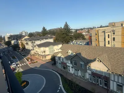an aerial view of a town with houses and a street at Mollies Alpha in Langford