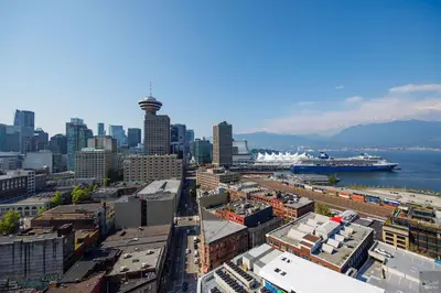 an aerial view of a city with a harbor at Spacious 2BD in Vancouver Patio with Ocean View in Vancouver