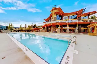 a large swimming pool in front of a building at Copper Sky Paradise in West Kelowna