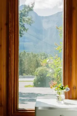 a window with a view of a mountain view at Gateway Suites near Banff in Canmore