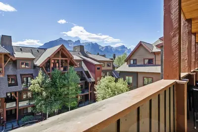 a view from the balcony of a apartment building at Spacious Rockies Escape near Banff Hot tub and Gym in Canmore