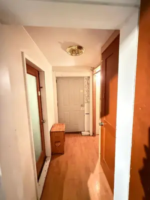 an empty hallway with a door and a room at Downtown Central City Cozy Private 2 Bedroom Basement Suite - Independent Entry in Surrey