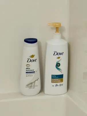 a couple of bottles of detergent and a detergentinylinylinylinylinyl at Casa Del Mar-A family Suite in Victoria in Langford
