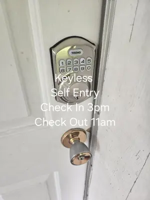 a keyless self entry check in spam check outhtml on a door at Self Check-In Keyless Private Entry DBL Queen Suite in Mission City