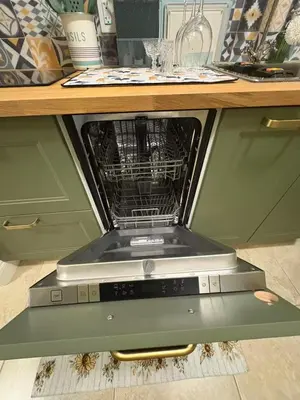 an oven with its door open in a kitchen at A Room of One's Own-A perfect getaway by the sea in North Nanaimo in Nanaimo