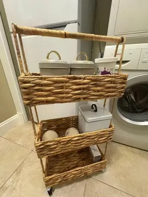 a basket with eggs in it next to a washing machine at A Room of One's Own-A perfect getaway by the sea in North Nanaimo in Nanaimo
