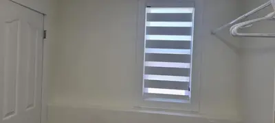 a stair case in a bathroom with a window at Single Court in Abbotsford