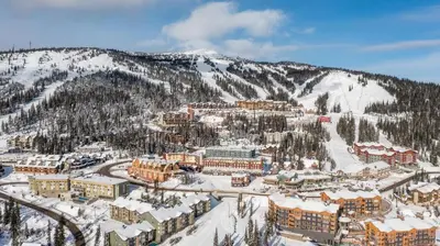 an aerial view of a resort in the snow at Raven's Nest - Mtn View & Hot Tub sleeps 6 in Carmi