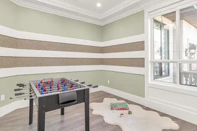 a room with a table with legos on it at 8BR New Spacious Home White Rock HVAC Free Parking in Surrey