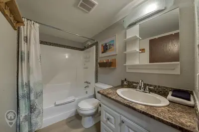 a bathroom with a sink and a toilet and a shower at InnWest by StayIn in Kimberley