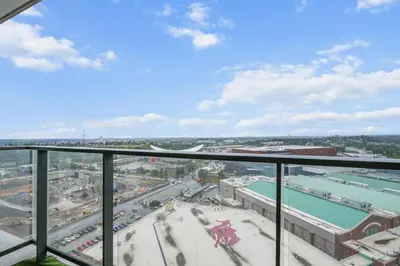a view of a city from a building at Downtown Calgary Modern 1BR with Pullout couch in Calgary