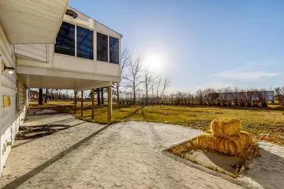 a house with a star on the side of it at Acreage, 3 King Beds and Ensuites, Dance Floor, Fireplace, AC in Calgary