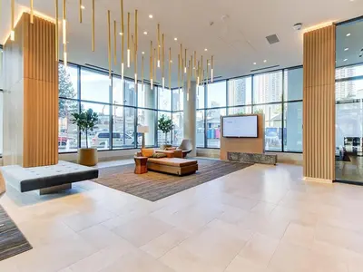 a lobby of a building with a tv in it at Corporate Stays Hazel 1 Bedroom in Burnaby
