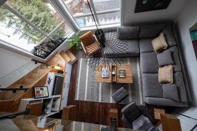 an overhead view of a living room with a couch at Fully Renovated Penthouse Loft at Fernie Alpine Resort in Fernie