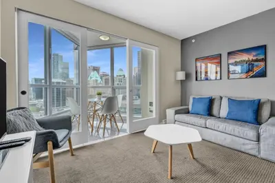 a living room with a couch and a table at Corporate Stays Capitol Residences 1 Bedroom in Vancouver