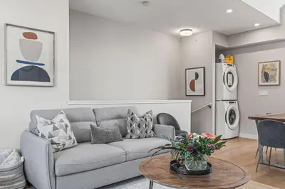 a living room with a couch and a table at 3BR with Stunning Views Self Check-In and Free Parking in Canmore