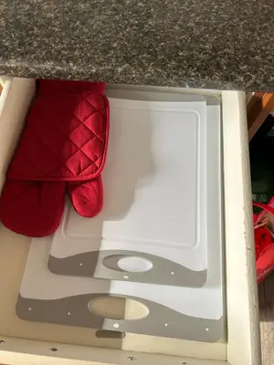 a drawer in a counter top with a red item at Luxurious & Spacious 4-Bedroom Vacation Home in Edmonton