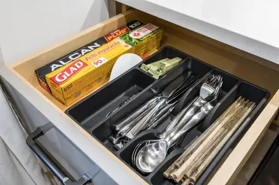 a drawer in a kitchen sink with utensils at Brand-New Luxury Dunbar 4BR Home - Near UBC - Sleep 10 - Ideal for Family in Vancouver
