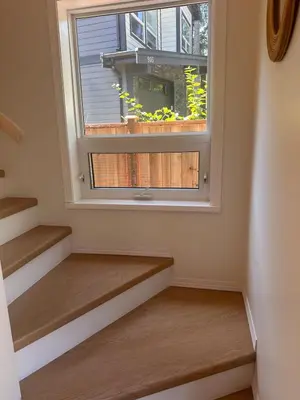 a room with stairs and a window with a window sill at Lake Trail Guesthouse in Victoria