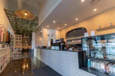 a restaurant with a counter in a store at Rockies Retreat Getaway Heated Pool &Hot Tub Gym in Dead Man's Flats
