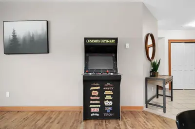 a restaurant with a cash register in a room at Spacious 3 BR Condo with Gym and Hot tub in Canmore