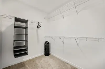 a room with shelves and a person on a wall at Single Detached Full House with Ping Pong King Bed and Garage in Edmonton