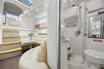 an interior of an rv with a toilet and a sink at COSY FLOATING HOME IN Vancouver downtown in Vancouver