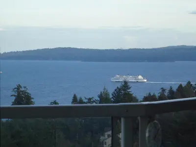 a cruise ship on a large body of water at Gibralter Rock Ocean View B&B in Nanaimo