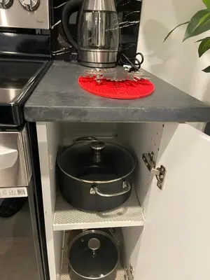 a pot sitting on top of a kitchen counter at The Loft Modern in Calgary