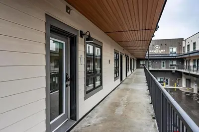 a walkway on the side of a building at Downtown Revelstoke Retreat by Canadian Rockies Vacation Rentals in Revelstoke