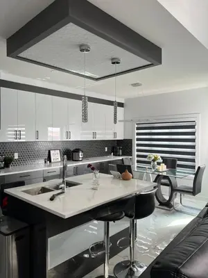 a kitchen with a large island in the middle at Private room with full washroom in Edmonton