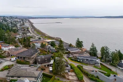 an aerial view of a town next to a body of water at Luxury Modern 2-Bedroom Suite Near Transit & Shops in White Rock