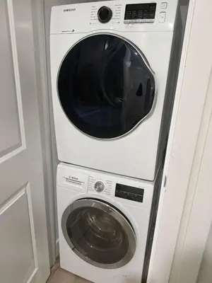a white washer and dryer in a room at ideal place in Prince George