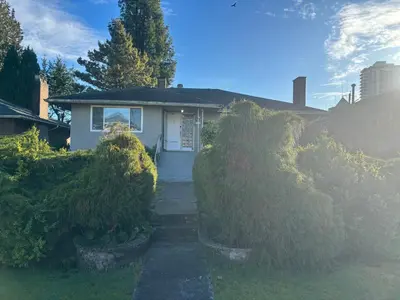 a house with a pathway leading to the front door at Charming Bright 3BR House - Upper Level Suite in Burnaby