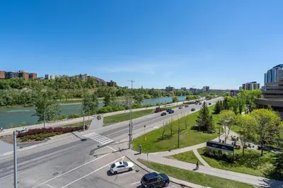 an aerial view of a street with cars on the road at Delightful 2 BR And 2 Bath Water View in Downtown in Calgary
