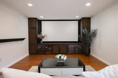 a living room with a large flat screen tv at Comfort Spacious 2-BR Suite in Arbutus in Vancouver