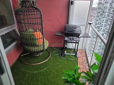 a balcony with a bird cage on the floor at Breath-Taking-View-5 Guest DTskyline-18th Floor in Calgary
