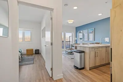 a large kitchen with a sink and a counter at Cozy 2BR apartment in Golden near DT in Golden