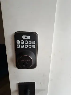a black remote control in a white drawer at Downtown Vancouver Rooms - Walk to SkyTrain & BC Place, Free Parking & Fast Wi-Fi in Vancouver
