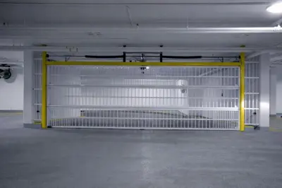 a large white garage with yellow and white racks at 431 Frontier in Calgary