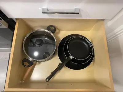 a wooden box with two frying pans and a magnifier at 4615 Inverness Street Vancouver King And Queen size 2 Bedrooms Suite with Private Entry in Vancouver