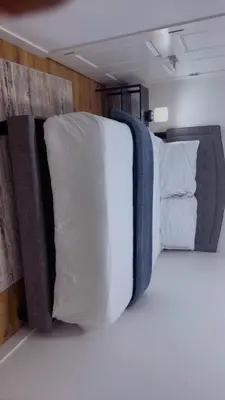 two pillows on a bed in a room at Stylish and Cozy 2-Bedroom Guest Suite in West Edmonton in Edmonton