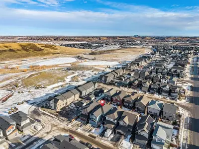an aerial view of a city with buildings at Spacious Modern 3 Bedroom Basement Suite in Calgary