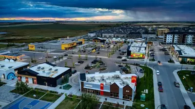 an aerial view of a city with a street at Modern 1BR Private Suite NW Near Airport & Amazing Shopping! Free Netflix, Parking! in Calgary