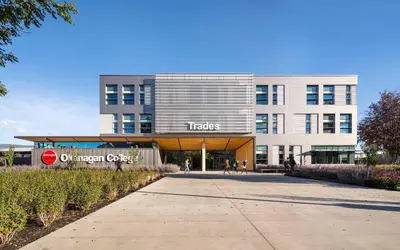 an office building with a sign that reads transfers at Private ensuite bedroom with independent entrance in South Pandosy Gyro beach OC KGH in Kelowna
