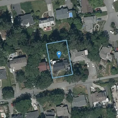 a blue spot on a house in a suburb at 2 Bedroom 1 Bath On An Oak Tree Lined End Street On The Galloping Goose in Victoria