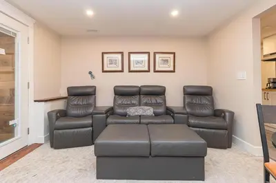 a living room with a couch and two chairs at 2 Bedroom 1 Bath On An Oak Tree Lined End Street On The Galloping Goose in Victoria