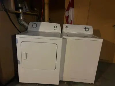 two white appliances are sitting next to each other at Vancouver Budget Stay - Airport 10 Min - Free Parking & Fast WiFi in Vancouver