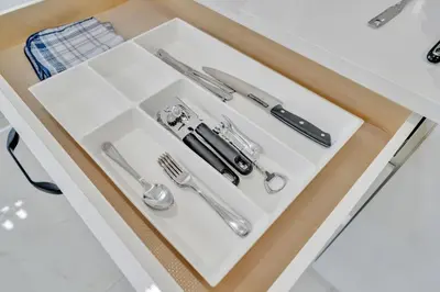 a tray with utensils on a table at 3 Bedrooms Brand New Luxury Home Close to Amenity in Leduc