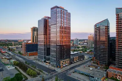 an aerial view of a city with tall buildings at Simple Minimalist Condo For Busy Students or Professionals in Calgary